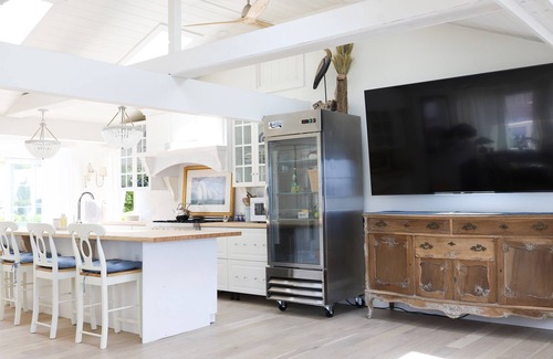 Bristol Cottage | Old fashioned designer front porch living by the sea with expansive water views.