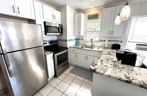 Indian Shores Cottage | OLD FLORIDA CHARM- DIRECT BEACH FRONT COTTAGE - STEP RIGHT INTO THE SAND!