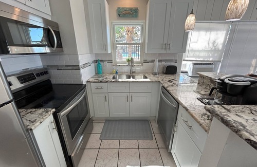 Indian Shores Cottage | OLD FLORIDA CHARM- DIRECT BEACH FRONT COTTAGE - STEP RIGHT INTO THE SAND!