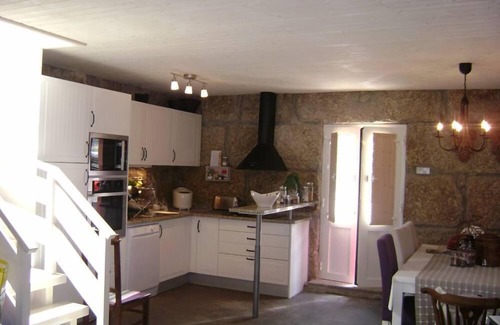 Amarante House | Old stone house with swimming pool and river.