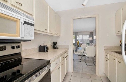 Redevelopment Area Apartment | Olde Naples Paradise 803