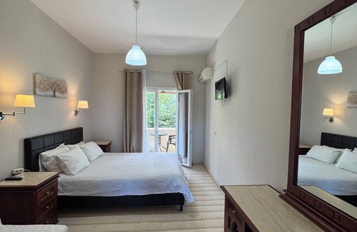 Acharavi House | Olive Garden Studios & Apts