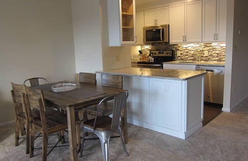 East Burke Condo | On Burke Mountain, bike in bike out. Pool, Hot tub, Gym access at the hotel.