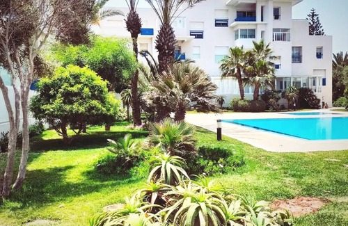 Essaouira Coast Apartment | On the Beach you see Horses and Quad Riders