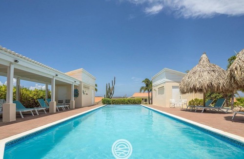 Santa Catharina House | On the beautiful island of Curacao, surrounded by turquoise waters and lush tropical surroundings, there is an enchanting home that offers the perfect vacation retreat for 4 people.