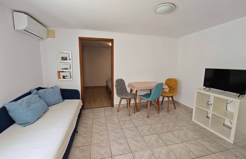 Veli Losinj Apartment | One bedroom apartment with terrace and sea view Veli Lošinj, Lošinj (A-8031-a)