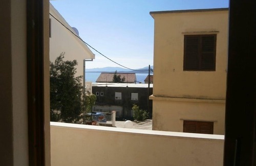 Igrane Apartment | One bedroom apartment with balcony and sea view Igrane, Makarska (A-13535-a)