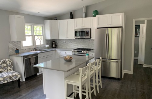 Allmendinger Heights House | One Bedroom Carriage House Near U of M Campus and Athletic Facilities