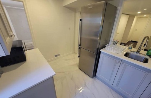 Ajax Apartment | One Bedroom Guest suite with separate entrance