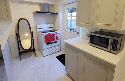 Ajax Apartment | One Bedroom Guest suite with separate entrance