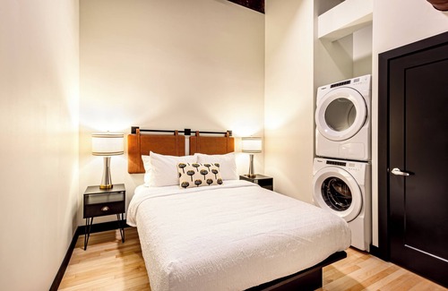 Madison Hotel | One Bedroom King with Den with views of the heart of downtown.