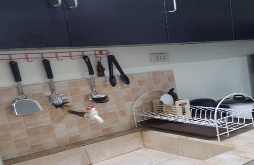 Puerto Princesa City Centre House | One Bedroom village House Close to Beaches