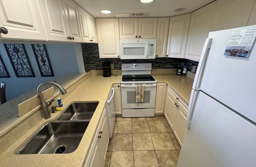 Shelter Cove Condo | One bedroom Harbourside Villa in Shelter Cove Harbour - pool and spa