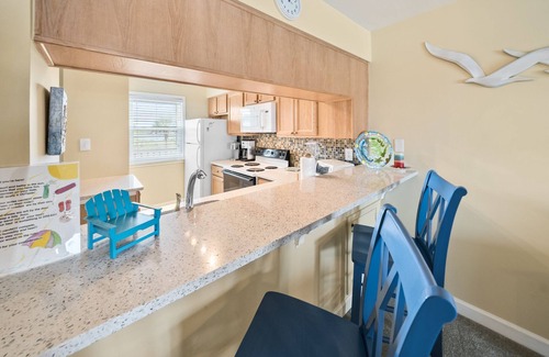 Inlet Beach Heights Condo | One level! First Floor, never before rented. Exceptional, Clean, Great Rates.