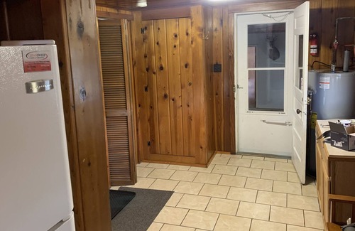 Standish House | One mile east of the Saganing Casino 50 feet from the beach, private boat launch