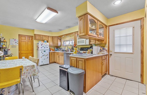 Plum House | One mile from the US Open with 3 en suites!