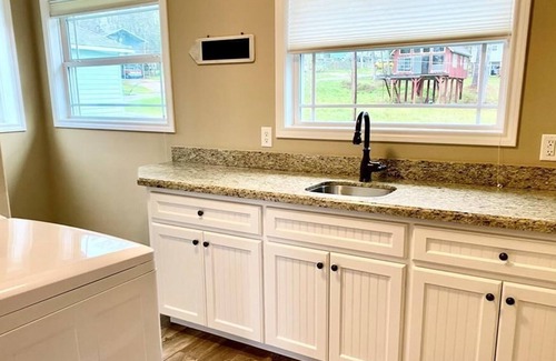 Pointblank House | One-of-a-kind 3-story home with a Panoramic Views of the lake