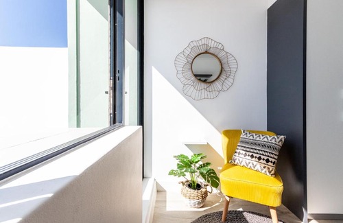 Cape Town City Centre Apartment | One On Albert -Vibrant Woodstock Apartment with Private Patio Area