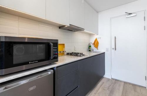 Cape Town City Centre Apartment | One On Albert -Vibrant Woodstock Apartment with Private Patio Area