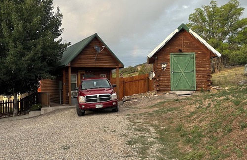 Collbran Apartment | One room guest house with hot tub, three twin beds, one futon, kitchen, bathroom