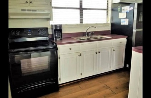 Fort Morgan Cottage | ONLY 20 feet from the Bay/See Dolphins, kayaks,etc