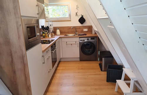 Carolinensiel House | Only roof house Murmel 5, charging station f. E-cars, WLAN, beach chair, fireplace