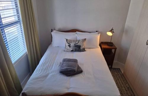 Mykonos House | OosiesRus - Charming Langebaan Villa with Garden View