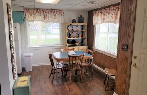 Essexville House | Open concept 2 bedroom ranch with attached garage and deck