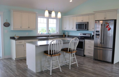 Clinton House | Open Concept 4 Bedroom Cottage Overlooking The Southwest River