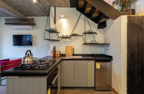 Astorga Apartment | Open Concept Penthouse Loft @ Nido Sky: Unit 17