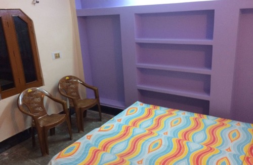 Aliganj House | Open terrace with double bedroom