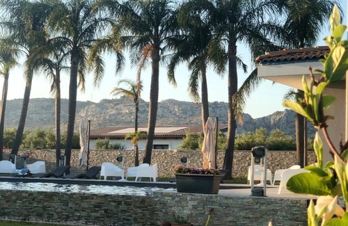 Floridia Villa | Orange house with large park and swimming pool.
