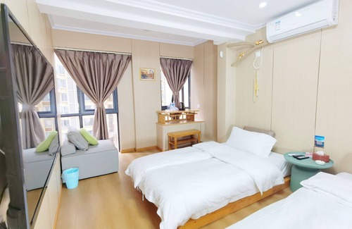 Gaoxin Hotel | Orange Mingwu Hotel with Cat Cafe