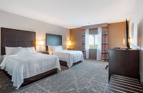Waldron Hotel | Orangewood Inn & Suites Kansas City Airport