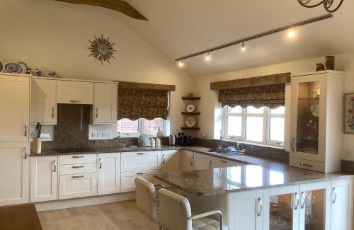 Castle Bytham House | Orchard Cottage, Clematis cottages, Stamford. Accessible luxury home.