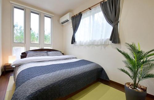 Nakijin Apartment | Orchid house