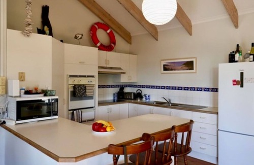 Guerilla Bay House | Original art filled home in Guerilla Bay