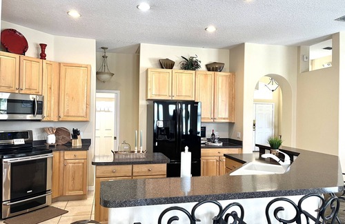 Ridgewood Lakes House | Orlando Davenport by Disney with pool and spa and view to the lake Golf Course