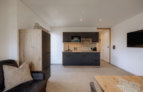 Laces Apartment | Ortsried-Hof, Apartment Panorama - Dachterrasse mit Whirlpool und Sauna
