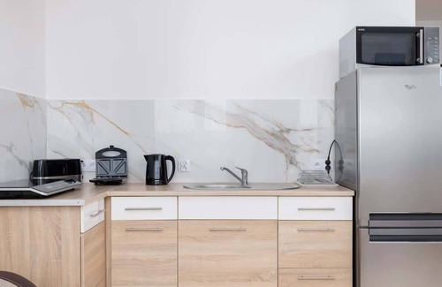Wieliczka Apartment | Os Szymanowskiego 18 Trendy Apartment Parking