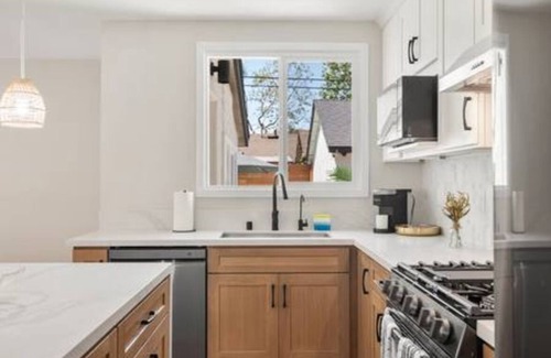 The Plaza House | Ostrom · Modern heated pool&spa + 5 mi to beach