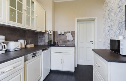 Ottersleben Apartment | OtterslebenGartenblick37 - Küche & Garten, bis zu 3 Personen