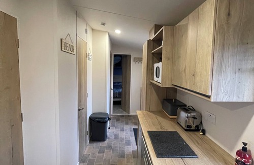 Reighton House | Our Beautiful home from home caravan Sea views of Reighton beach & Pet Friendly
