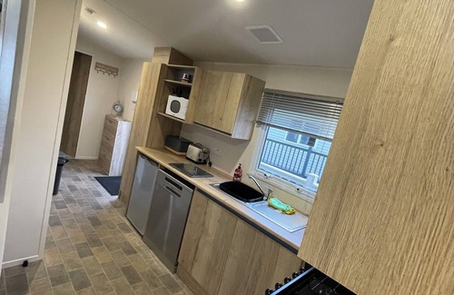 Reighton House | Our Beautiful home from home caravan Sea views of Reighton beach & Pet Friendly
