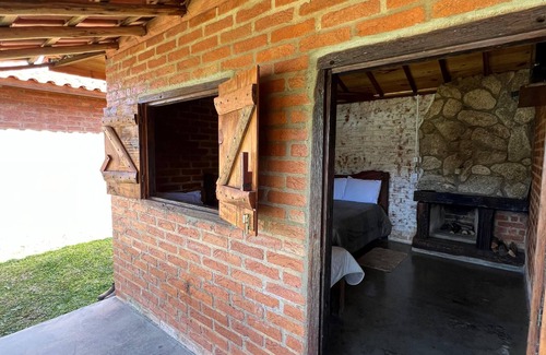 Senador Amaral House | Our cabin at the top of the property with verandah and veranda