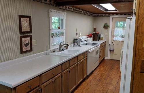 Freedom Cabin | Our creekside cabin is nestled deep in the country on a secluded lane.
