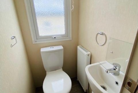 Grampound House | Our Osprey sleeps 4-6 persons-Tranquil holiday away from it all yet not far from St Austell- The Holiday Home has two bedrooms, living and dining area, equipped kitchen-decking-outdoor furniture-fishing lakes- This holiday home is not pet friendly