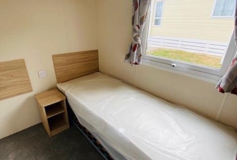Grampound House | Our Osprey sleeps 4-6 persons-Tranquil holiday away from it all yet not far from St Austell- The Holiday Home has two bedrooms, living and dining area, equipped kitchen-decking-outdoor furniture-fishing lakes- This holiday home is not pet friendly