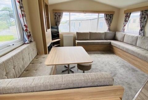 Grampound House | Our Osprey sleeps 4-6 persons-Tranquil holiday away from it all yet not far from St Austell- The Holiday Home has two bedrooms, living and dining area, equipped kitchen-decking-outdoor furniture-fishing lakes- This holiday home is not pet friendly