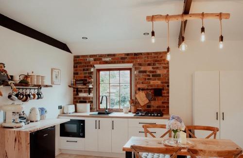 Riverside House | Outdoor Spa & Sauna with amazing views at Jaclyn Studio